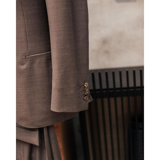 Brwon suit and light blue waistcoat